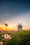 The historic old windmills inTÃ©s at Lake Balaton in Hungary, Beautiful sunset in the field