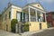 Historic old yellow home in French Quarter of New Orleans, Louisiana