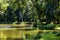 Historic park surrounding XVI century Rozalin Palace with vintage trees and ponds in Rozalin village in Mazovia region of Poland