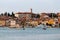 The historic part of Rovinj in the sunset. Above roofs of houses rises Monastery of St Francis