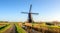 Historic polder mill in the Netherlands in the fall season