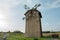 Historic Polish wooden windmill and blue sky
