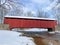 Historic Pool Forge Covered Bridge on a nice snowy morning in Lancaster County, Pennsylvania