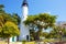 The historic and popular center, lighthouse and Duval Street in downtown Key West. Beautiful small town in Florida