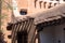 Historic pueblo style old adobe building on the Plaza in spring in Santa Fe, New Mexico, USA