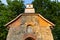 Historic renovated brick chapel from XIX century, Milowka, Poland.
