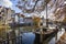 Historic Rotterdam Delfshaven with traditional houseboats moored near the quay in autumn