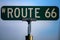 Historic Route 66 sign with a sky blue background. Travel and adventure. American roads.