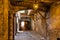 Historic Rue Obscure Dark Street underground passageway under harbor front houses in old town of Villefranche-sur-Mer in France