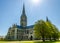 The historic Salisbury Cathedral and its spire on a clear and sunny spring day