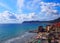 Historic Saracen tower on the beach in the Mediterranean city of Alassio on popular resort town on the Italian Riviera, Italy
