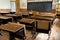 Historic School Classroom with Wooden Desks and Blackboard