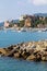 Historic seaside town of Rapallo facing the sea with port. Many boats moored in the marina.