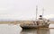 The Historic St. Christopher Shipwreck at the dock area of Ushuaia`s Coast, Province of Tierra del Fuego, Argentina