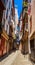 historic street or alley with houses in Ribeira district in Porto, Portugal