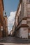 Historic street with old tenement houses in the Warsaw Old Town in Poland on a summer day