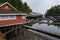 Historic Telegraph Cove buildings and boats on a cloudy day