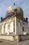 Historic tomb building with landscaped garden in Qutb Shahi Archaeological Park, Hyderabad, India