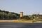 Historic Torre Zecca Tower view from promenade of Arno river of FLorence City. Italy