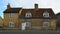 Historic town cottage white window frames and door