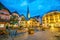 Historic town square of Hallstatt at night in the Austrian Alps