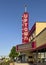 The historic Uptown Theater on Main Street in downtown Grand Prairie, Texas, on a bright sunny day.