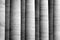 Historic vertical marble columns as black and white background