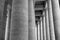 Historic vertical marble columns as black and white background