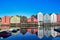 Historic warehouses on stilts from Trondheim with spectacular reflection