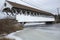Historic, white covered bridge of Paddleford truss design, New H