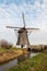 Historic windmill in a Dutch polder landscape