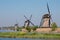 Historic windmills by the canal, at Kinderdijk, Holland