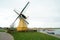 Historic yellow windmill at the port of Bruinisse in Zeeland