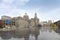 Historical architecture on the bund of Shanghai with reflection of buildings on rain, waterfront of the Huangpu River is a popular