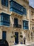 Historical architecture in Valetta, Malta. Traditional blue maltese balconies.