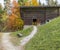 Historical barn in the alps, autumn colors, open doors