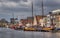 Historical boats on a canal in Leiden, Holland