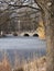 Historical bridge in baths park in European Warsaw city of Poland - vertical