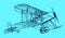 Historical british single-engine tractor two-seat biplane in side view on a blue background