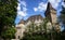 Historical building Vajdahunyad Castle with lake over the blue sky in main City Park. It has Romanesque, Gothic