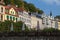 Historical buildings and bridge over the river Tepla in Karlovy