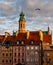 Historical buildings at Market Square of the Old Town with Christmas decorations in sunset. Warsaw, Poland