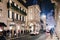 Historical buildings, stores and boutique shops on Via Montenapoleone street in Milan at night, luxury shopping street