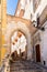 historical city gate, and narrow streets in the old town of Chieti (Italy)