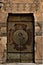 Historical door in wood and copper in qalwoun compound egypt