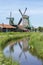 Historical dutch mills with the reflection