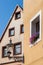 Historical facade with flowers and lantern- Bayreuth old town