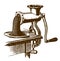 Historical hand-powered meat grinder or chopper with minced meat coming out of the machine