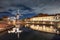 Historical harbor with windmill, drawbridge and mansions at night, Heusden