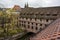 Historical Heilig-Geist-Spital Holy Spirit Hospital near Pegnitz river in the old town of Nuremberg, Bavaria, Germany